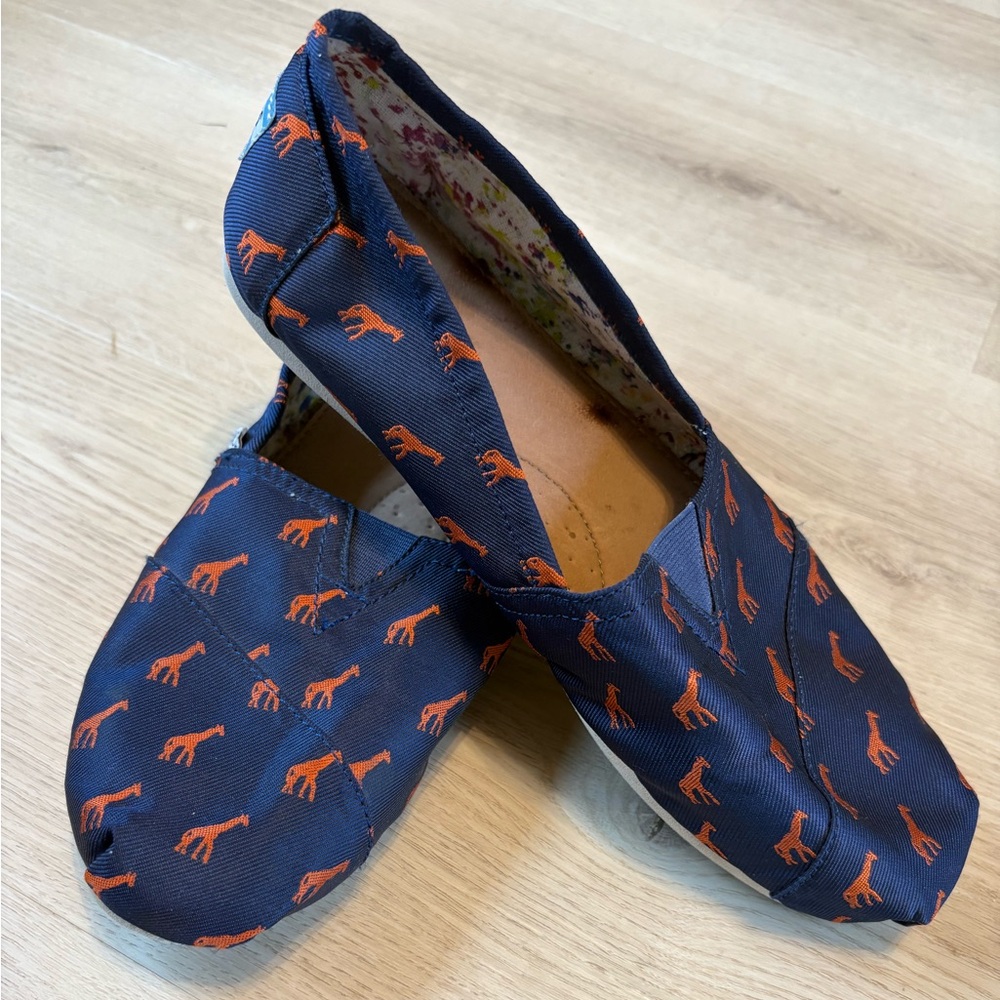 TOMS Navy Canvas Slip-On Shoes with Orange Giraffe Print